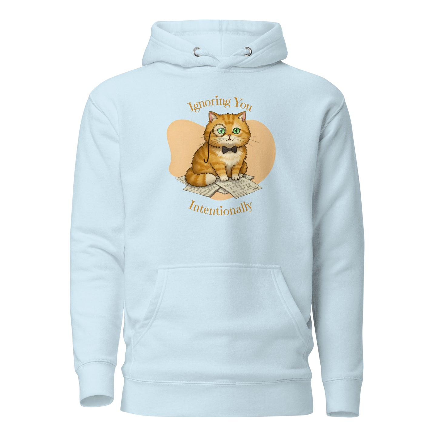 Front View of a unisex sky blue hoodie with a design of a cat wearing a monocle and the words 'Ignoring You Intentionally'.