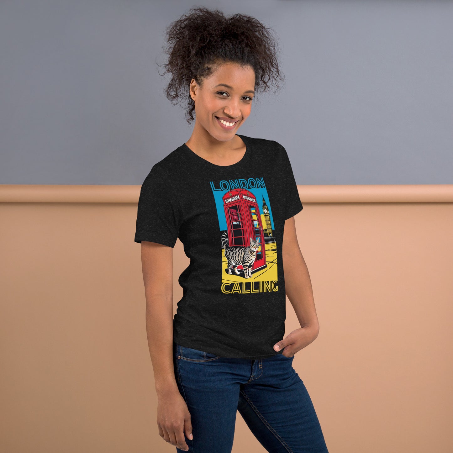 Woman wearing a black London Cat T-Shirt.