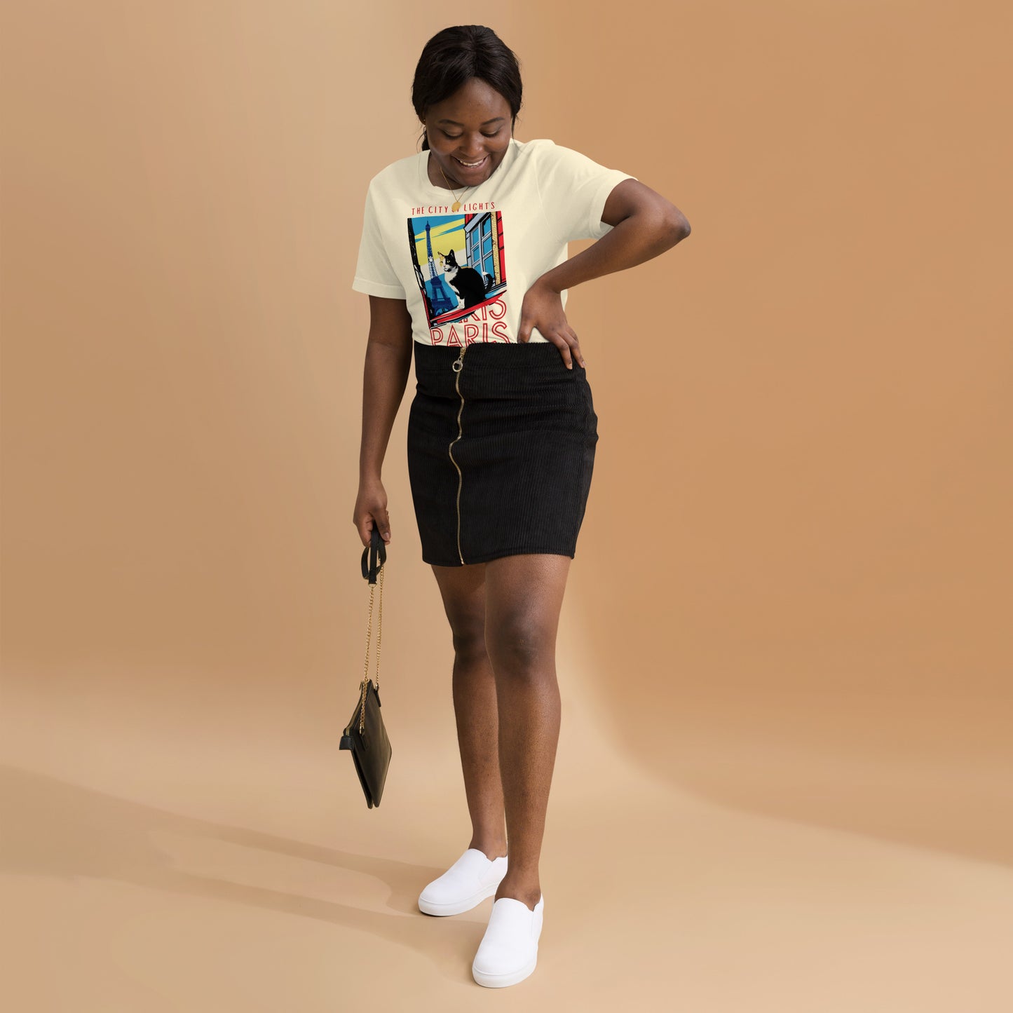 Woman wearing a natural Paris Cat T-Shirt.
