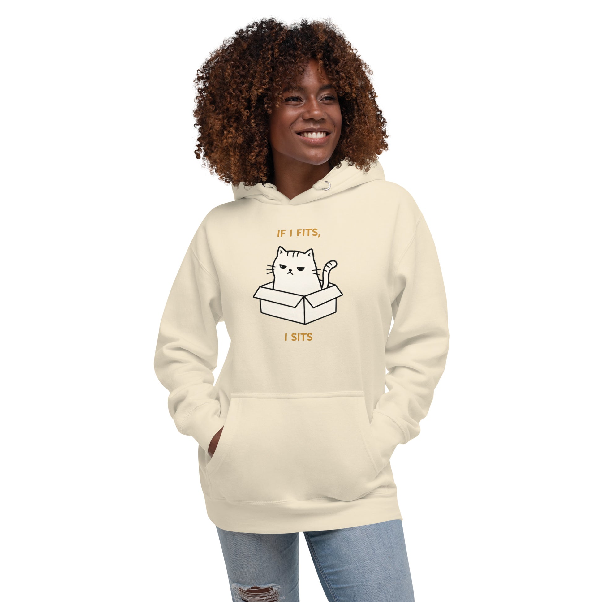 Woman modeling a unisex bone hoodie with a design of a cat sitting in a box and the words 'If I Fits, I Sits'. Front View