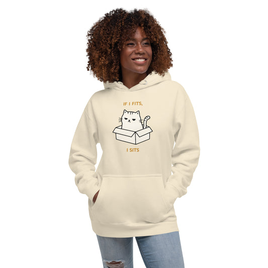 Woman modeling a unisex bone hoodie with a design of a cat sitting in a box and the words 'If I Fits, I Sits'. Front View