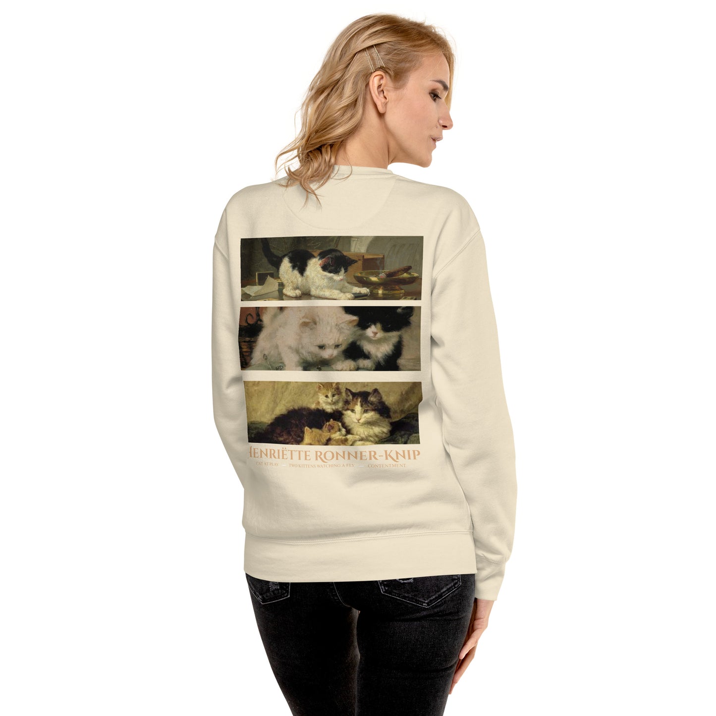 Woman wearing a bone beige Ronner-Knip Cat Graphic Sweatshirt.